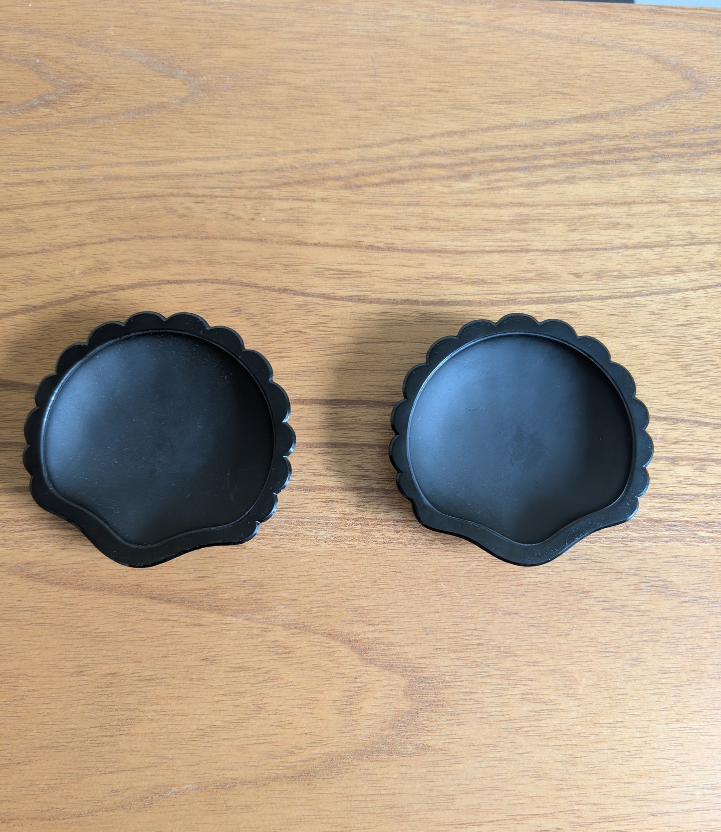 Pair of Black Glass Sea Shells
