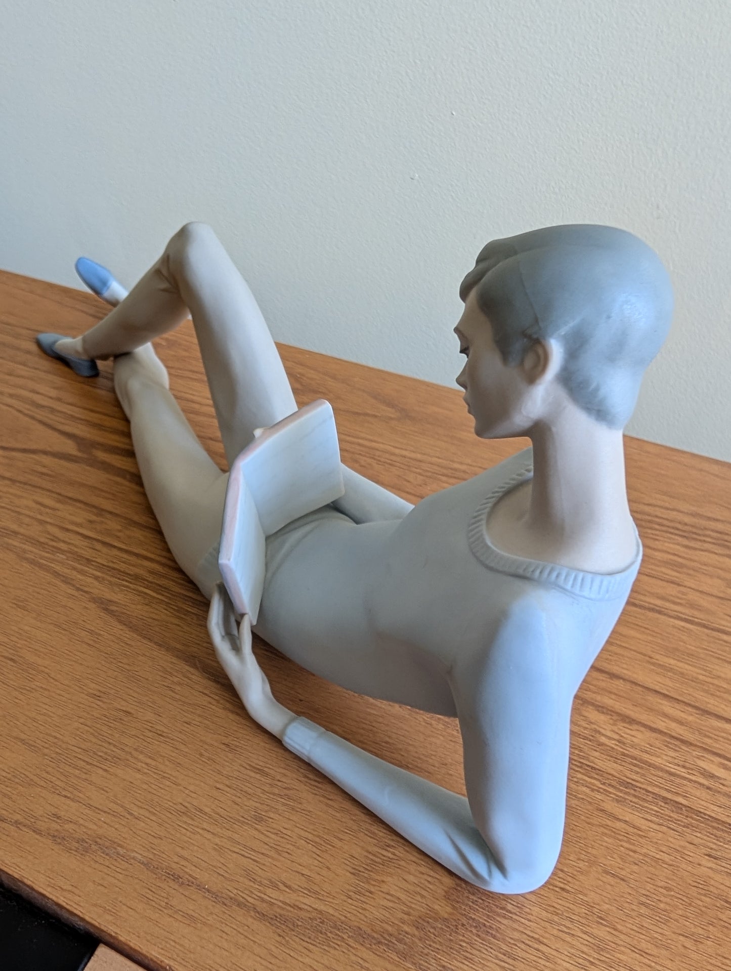 Lladro Boy Reclining With a Book