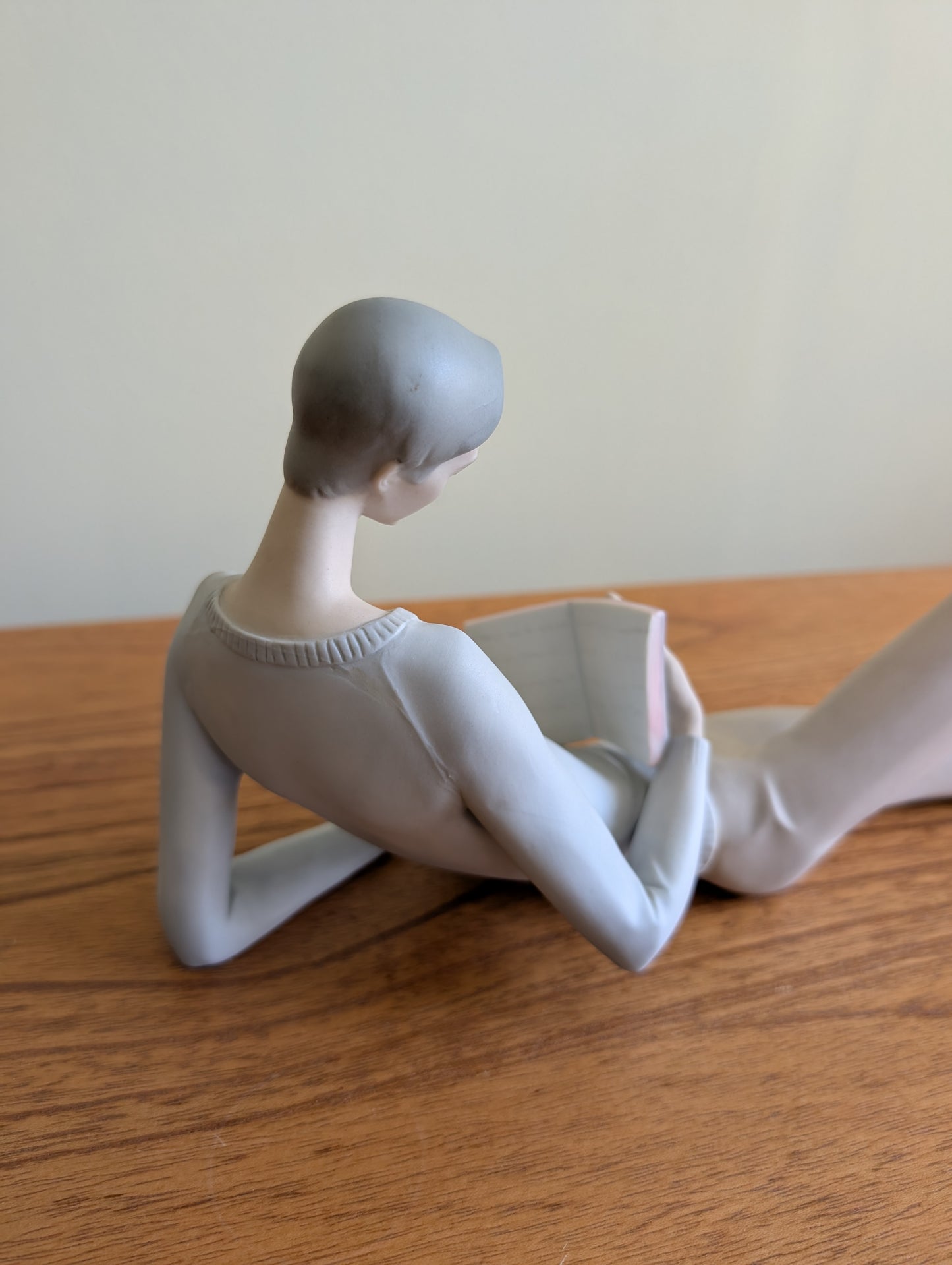 Lladro Boy Reclining With a Book