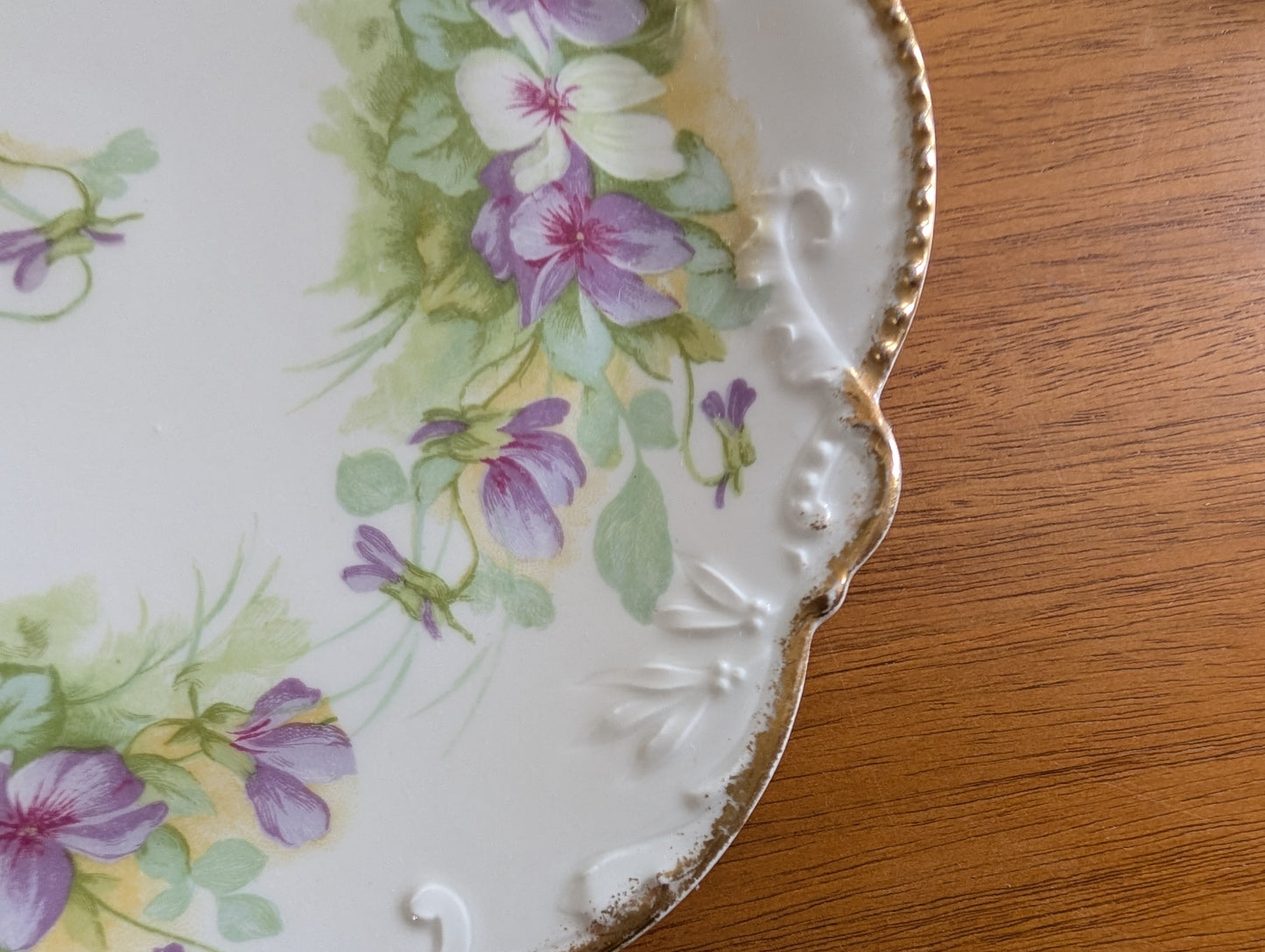 Set of 8 Limoges Coronet 8 inch Plates featuring Scalloped Gold Rims and Transferware Pansies