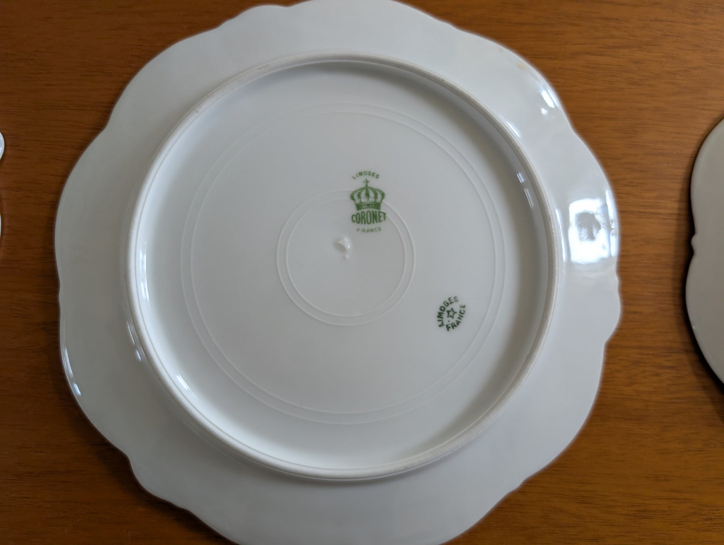 Set of 8 Limoges Coronet 8 inch Plates featuring Scalloped Gold Rims and Transferware Pansies