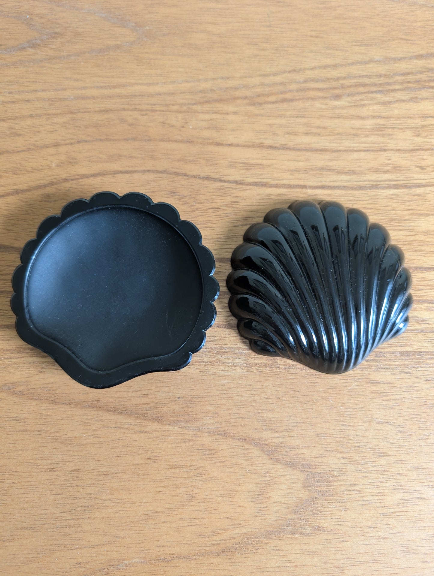 Pair of Black Glass Sea Shells