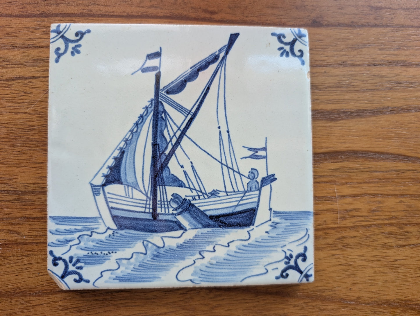 Delft Blue and White Tile 5 1/8 inches featuring Sail Boat Chipped Corner