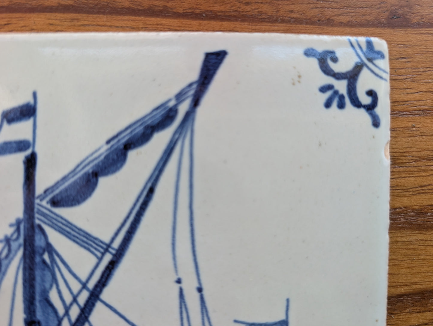 Delft Blue and White Tile 5 1/8 inches featuring Sail Boat Chipped Corner