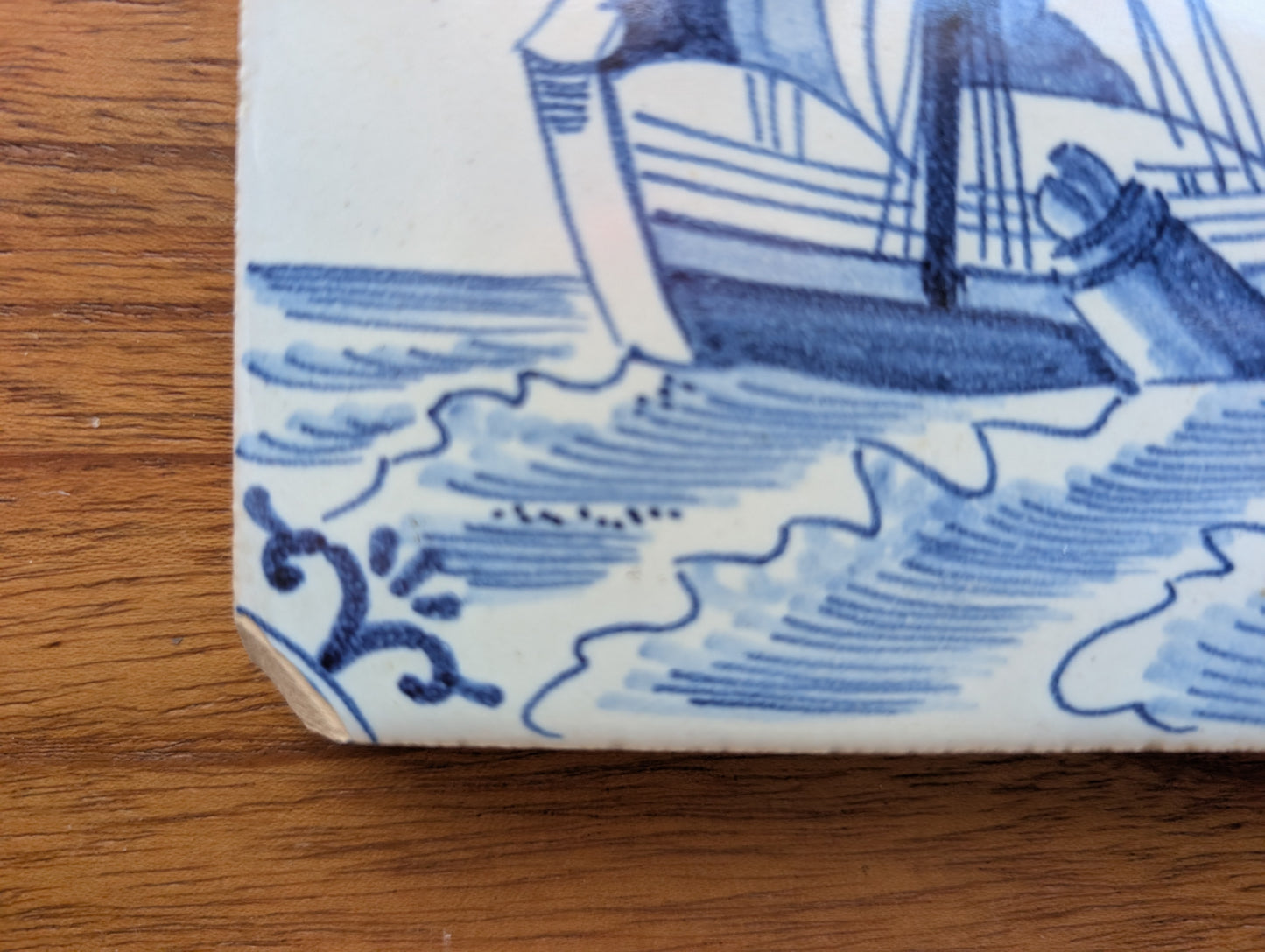 Delft Blue and White Tile 5 1/8 inches featuring Sail Boat Chipped Corner