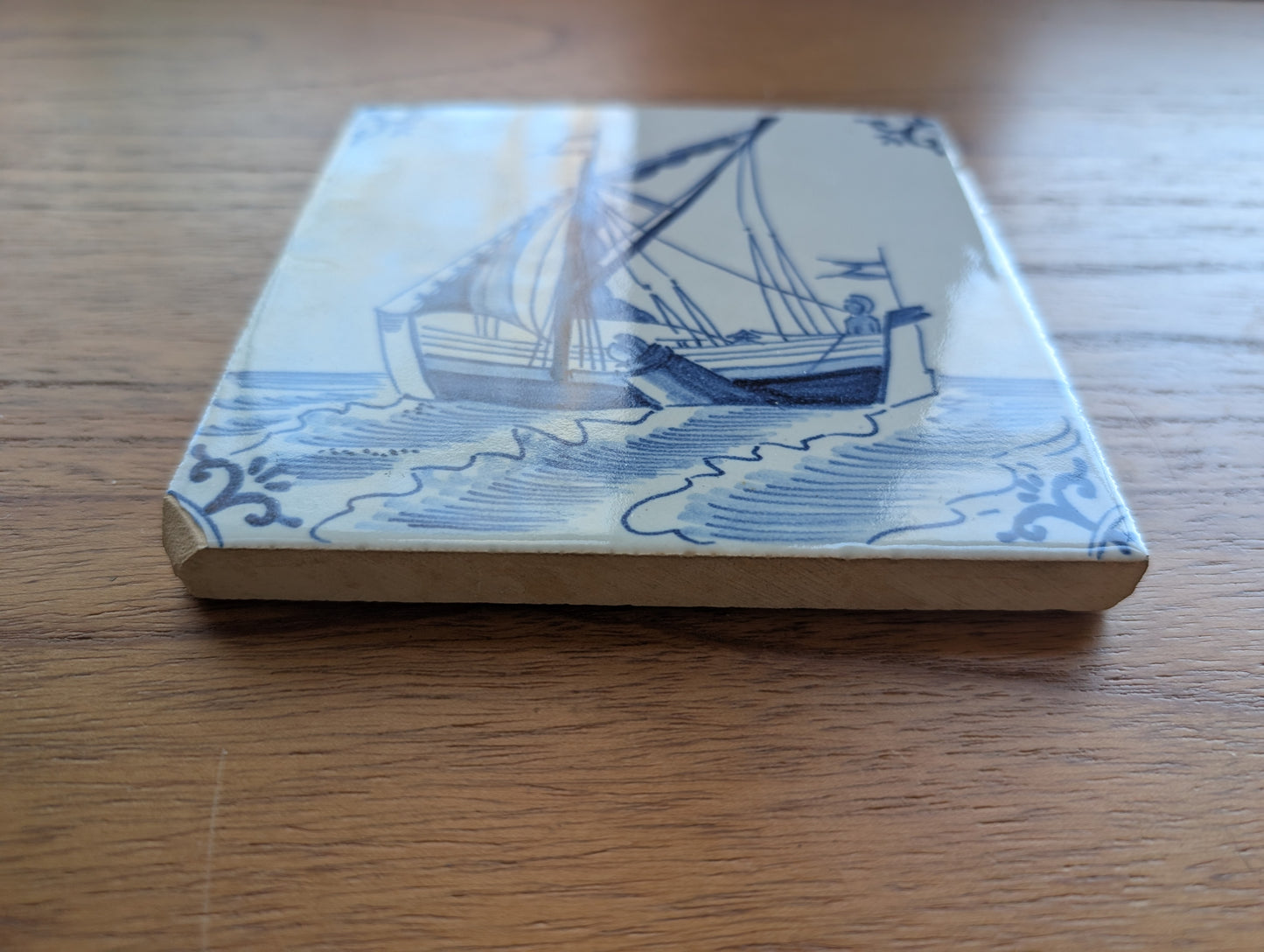 Delft Blue and White Tile 5 1/8 inches featuring Sail Boat Chipped Corner